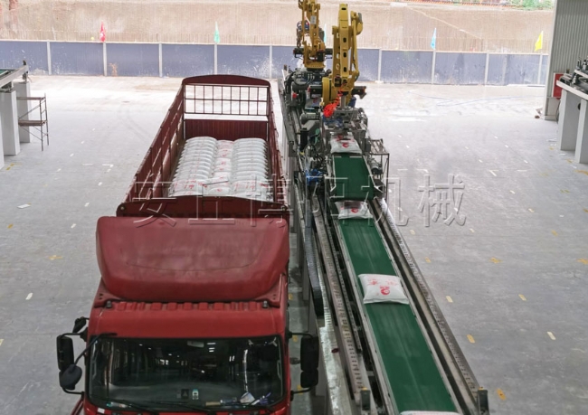 尿素全自动装车系统 机械手自动装车机工作现场